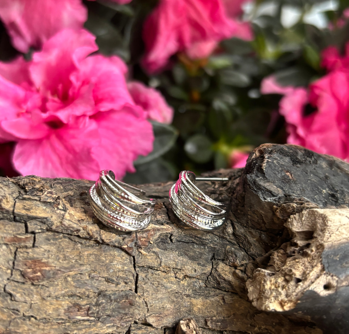 Rhodium Plated Twisted Multi Band Earrings